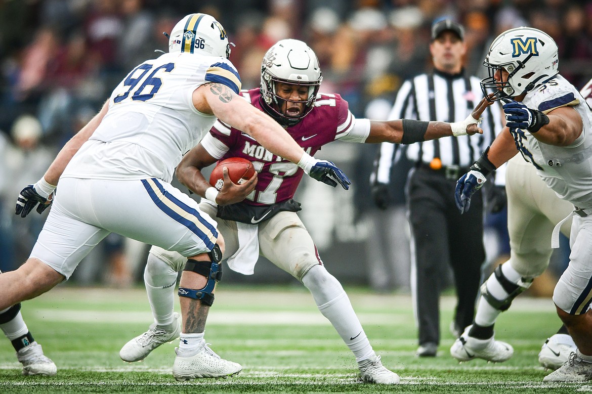 Grizzlies quarterback Clifton McDowell (17) looks for running room in the second quarter against Montana State in the 122nd Brawl of the Wild at Washington-Grizzly Stadium on Saturday, Nov. 18. (Casey Kreider/Daily Inter Lake)