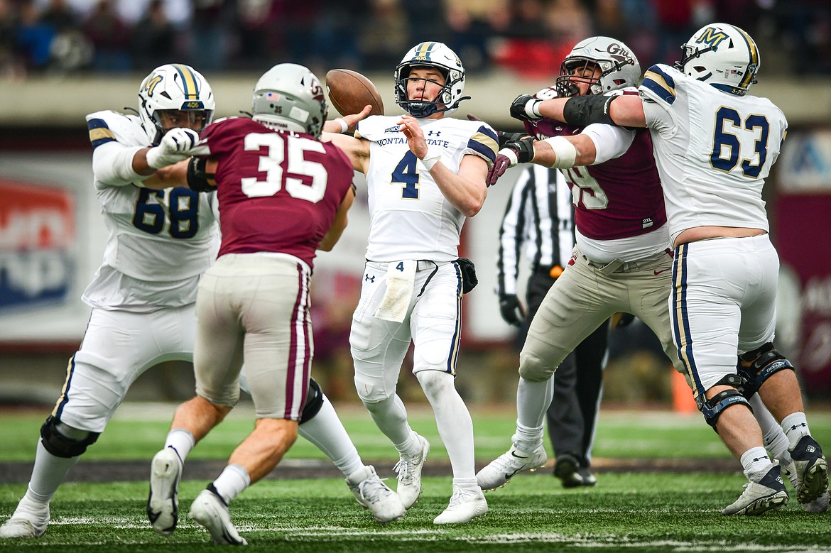 Bobcats quarterback Tommy Mellott (4) drops back to pass in the second quarter against Montana in the 122nd Brawl of the Wild at Washington-Grizzly Stadium on Saturday, Nov. 18. (Casey Kreider/Daily Inter Lake)
