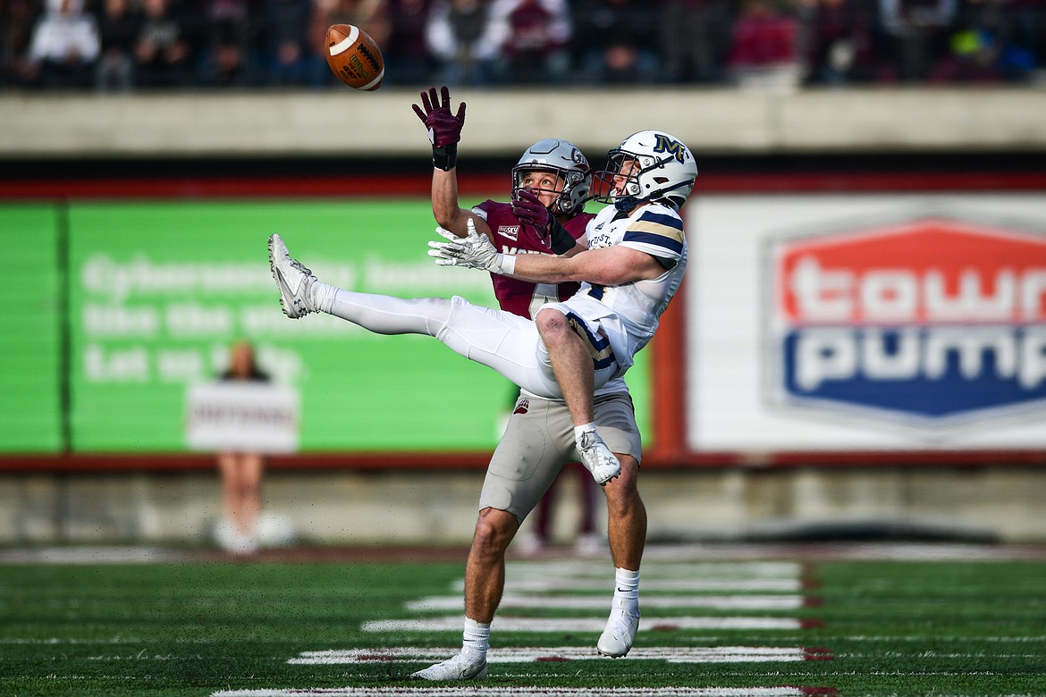 Bobcats wide receiver Taco Dowler (14) holds on to a reception in the third quarter against Montana in the 122nd Brawl of the Wild at Washington-Grizzly Stadium on Saturday, Nov. 18. (Casey Kreider/Daily Inter Lake)