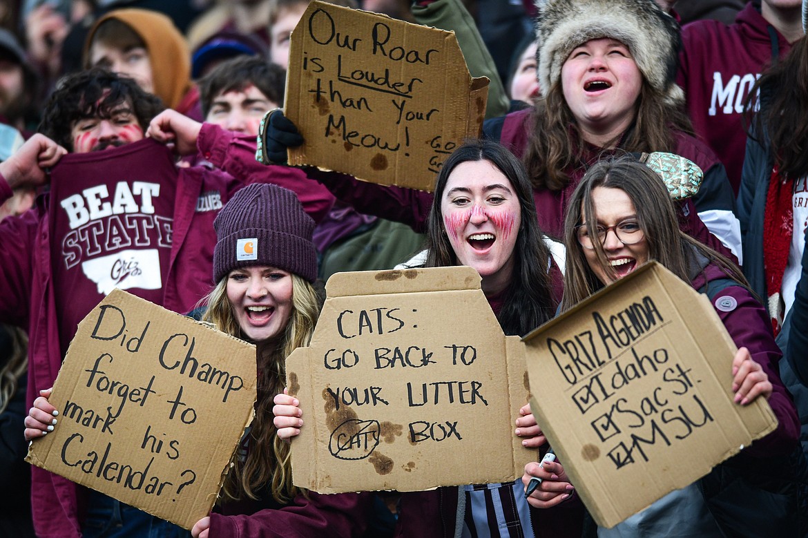 Griz fans hold signs in the fourth quarter of the team's 37-7 win over Montana State in the 122nd Brawl of the Wild at Washington-Grizzly Stadium on Saturday, Nov. 18. (Casey Kreider/Daily Inter Lake)