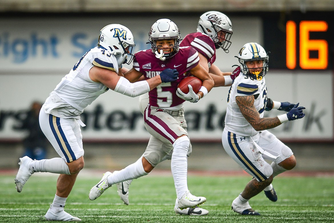 Montana wide receiver Junior Bergen (5) picks up yardage on a run in the third quarter against Montana State in the 122nd Brawl of the Wild at Washington-Grizzly Stadium on Saturday, Nov. 18. (Casey Kreider/Daily Inter Lake)