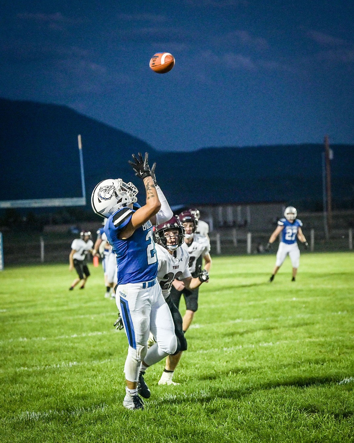 Bulldog Landon Walks Over Ice reaches for the pass during game against Troy. Landon is one of two local athletes chosen to play in the Indigenous Bowl. (Christa Umphrey photo)