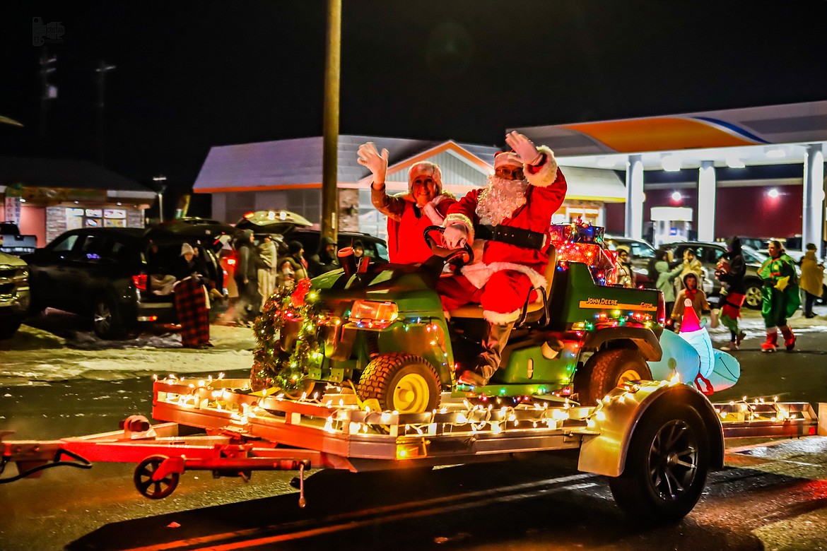 Mr. and Mrs. Claus are towed along Main Street in Othello during the 2022 Christmas Miracle on Main Street event outside Othello City Hall. The event is hosted by the Othello Holiday Committee and will take place on Dec. 2 this year.