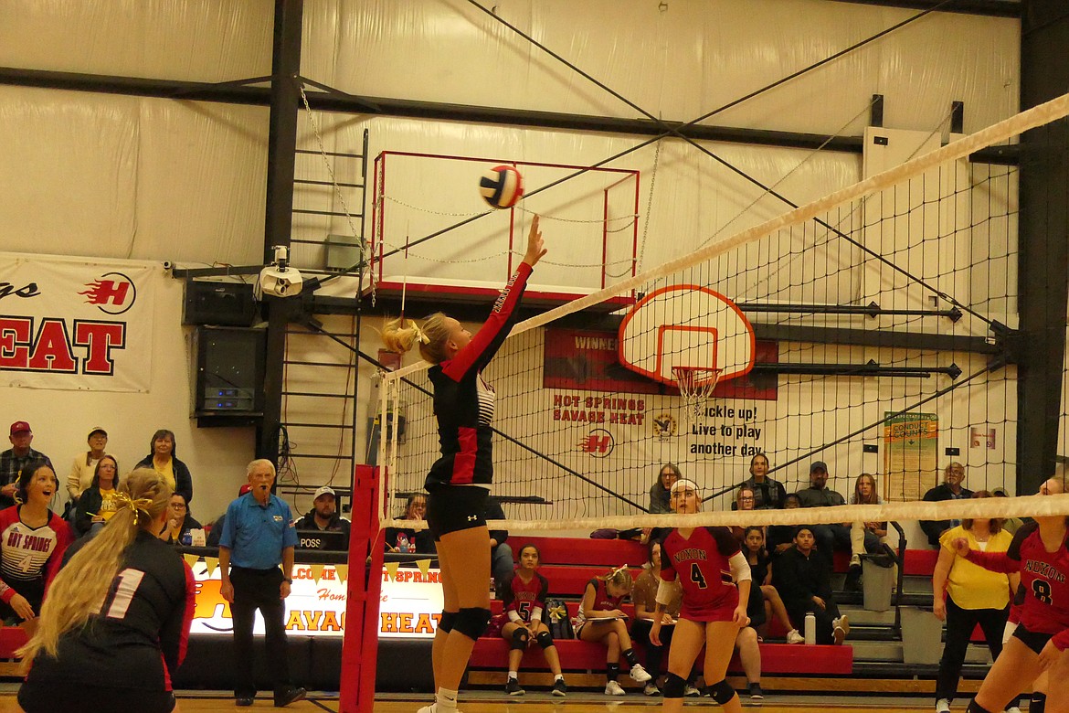 Hot Springs senior middle hitter Lauryn Aldridge goes up for a block during regular season action earlier this year.  Aldridge was selected last week to the 14C All-conference first team.  (Chuck Bandel/VP-MI)