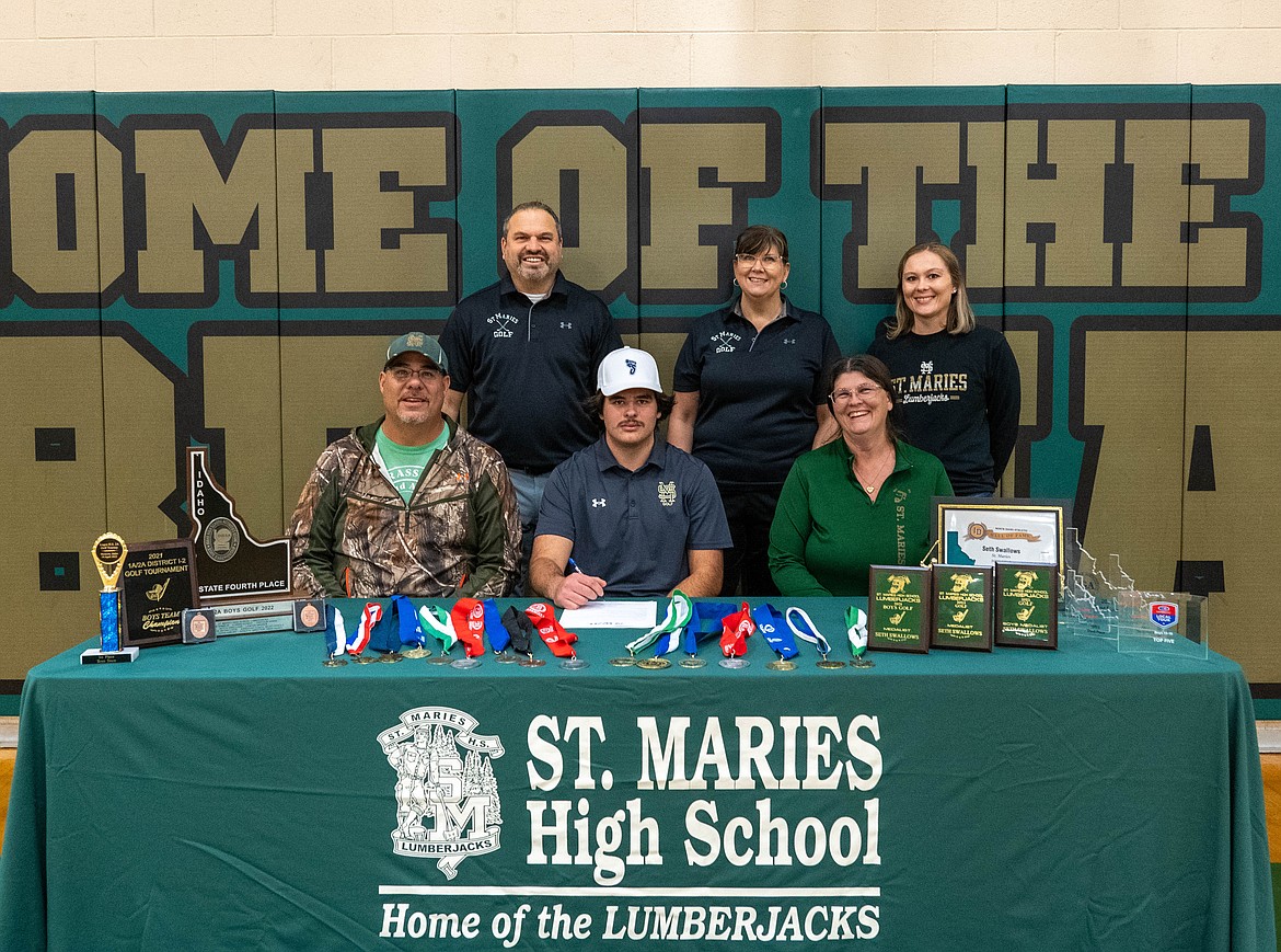 Courtesy photo
St. Maries High senior Seth Swallows recently signed a letter of intent to play golf at Community Colleges of Spokane. Seated from left are Keith Swallows, Seth Swallows and Nichole Swallows; and standing from left, St. Maries High golf coaches Bryan Chase and Becky Harold; and St. Maries High athletic director Dakota Wickard.