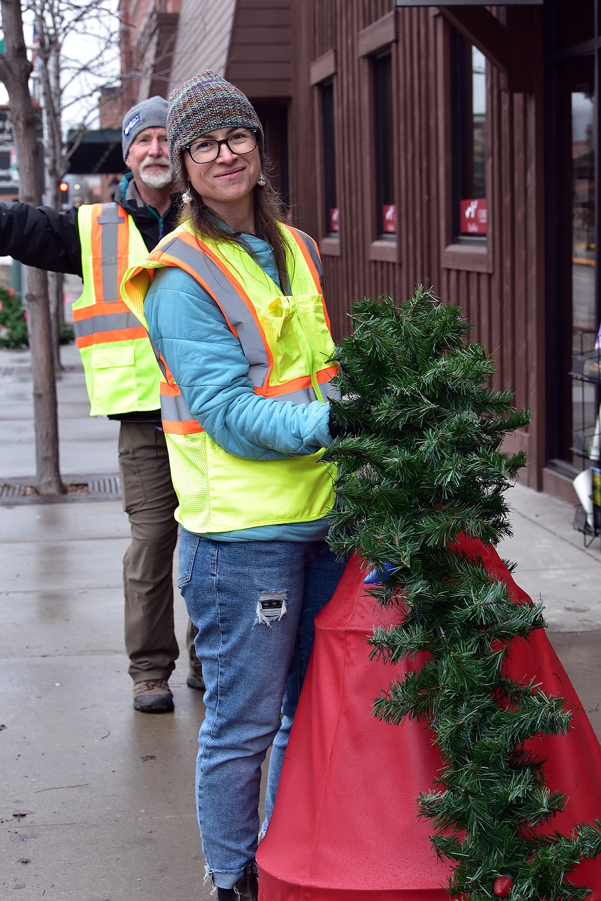 Flathead Electric Cooperative and several residents volunteered to put up Whitefish's winter decorations on Sunday. (Julie Engler/Whitefish Pilot)