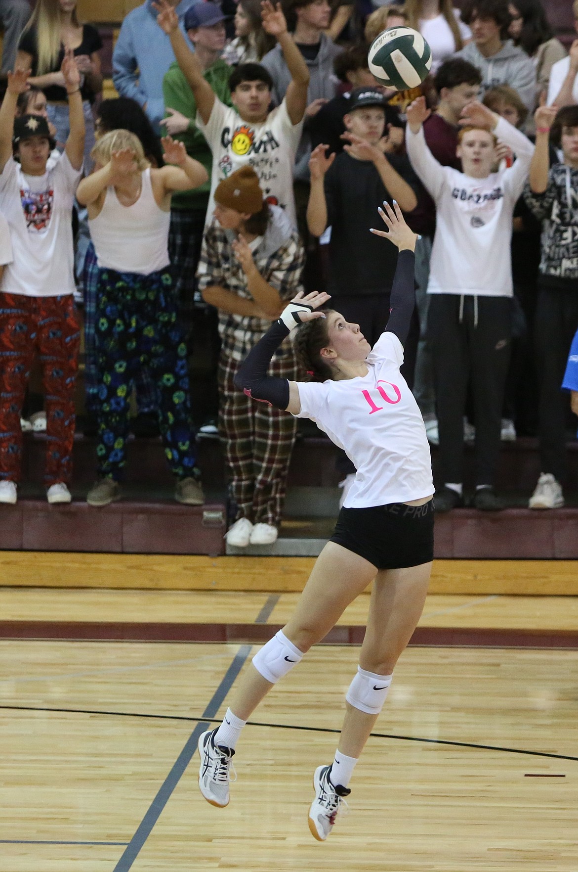 Moses Lake junior Makenna Stuart (10) serves the ball against West Valley (Yakima) on Oct. 17.