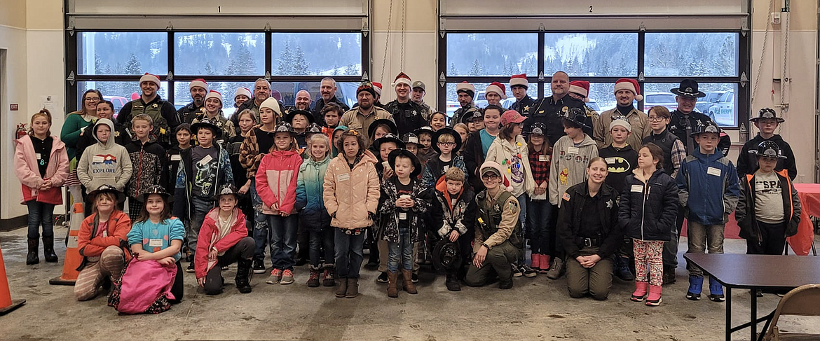 The 2022 Shop with a Cop event treated more than 90 local children to a Walmart shopping spree to buy gifts for themselves and for family members.