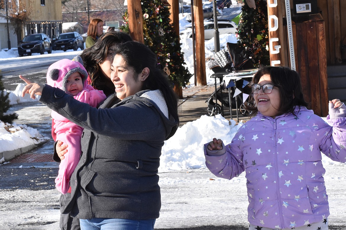 An excited family waits for Santa to make an appearance at last year’s Winterfest in Soap Lake. This year’s event is Dec. 2.