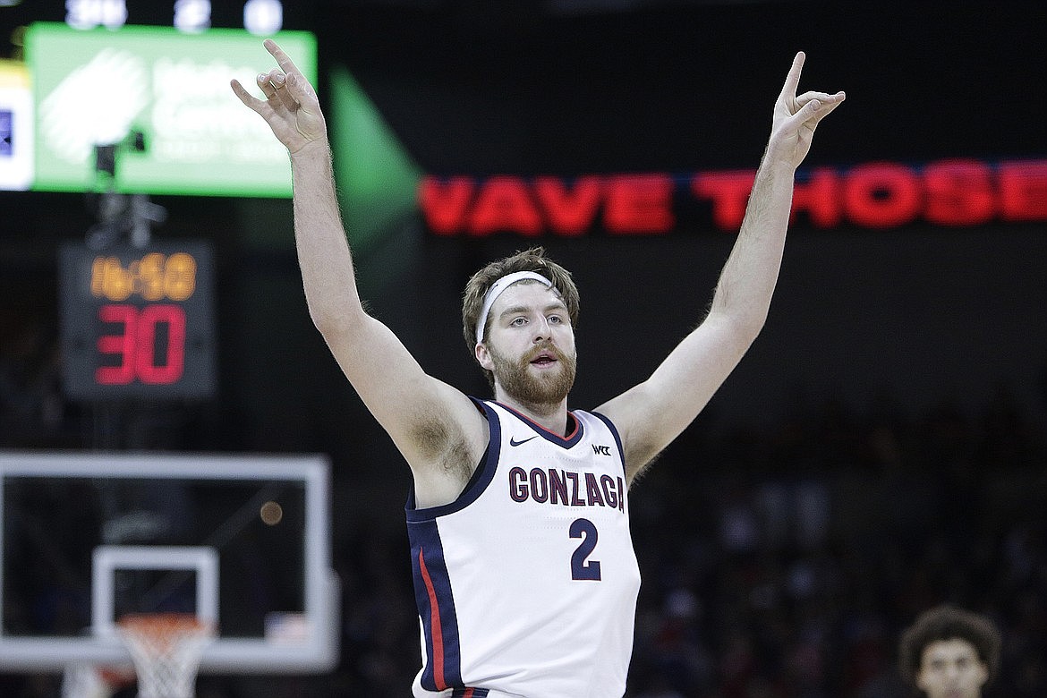 Former Zags forward Drew Timme, now with the Milwaukee Bucks' G League team, reacts after making a basket during the first half of an NCAA college basketball game, against Kentucky, Sunday, Nov. 20, 2022, in Spokane. The Zags defeated Kentucky in that matchup.