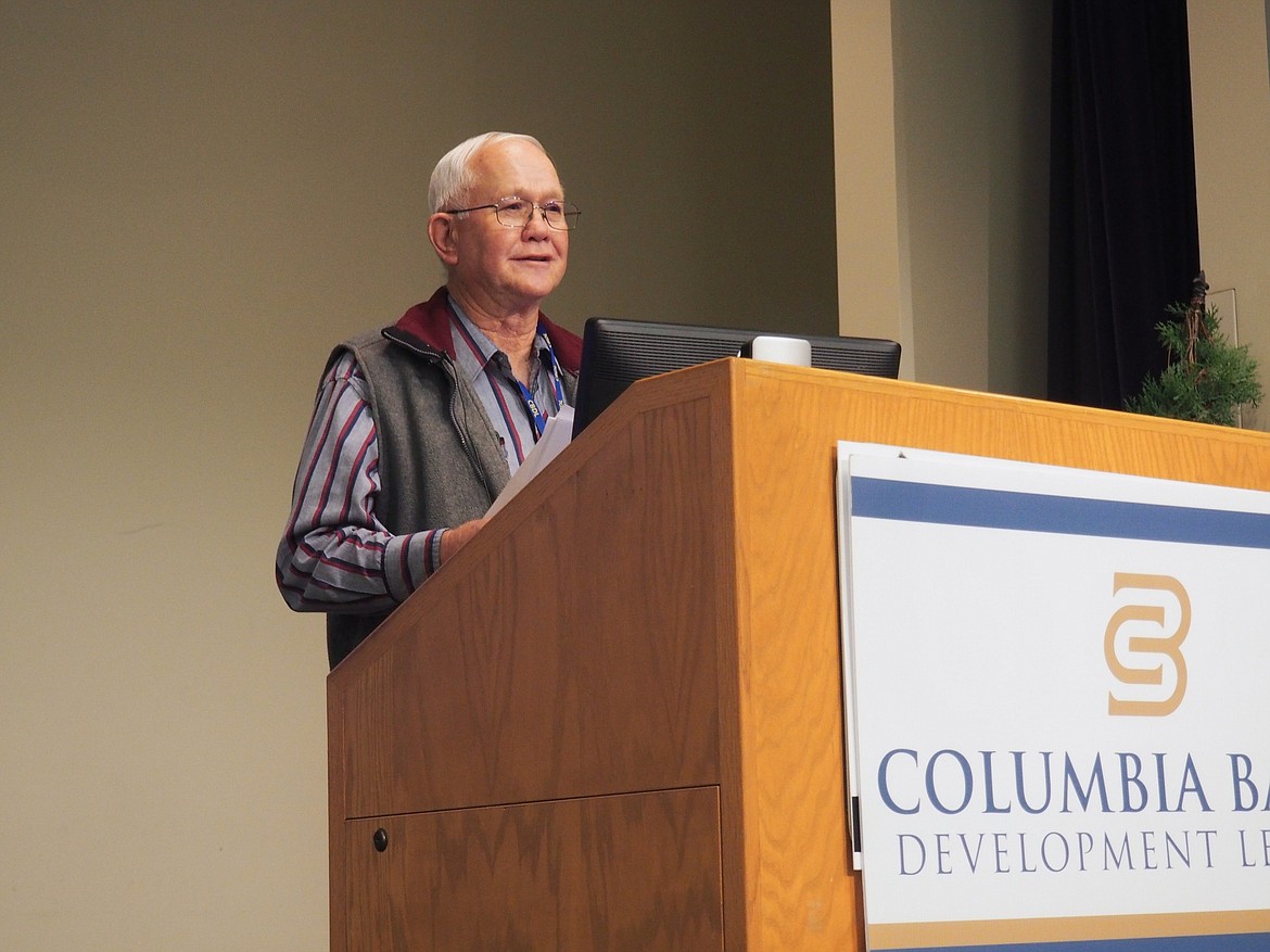 Columbia Basin Development League Board of Trustees Chair Dale Pomeroy speaks at the 59th annual Columbia Basin Development Conference in Moses Lake at Big Bend Community College. The CBDL is based in Cashmere.