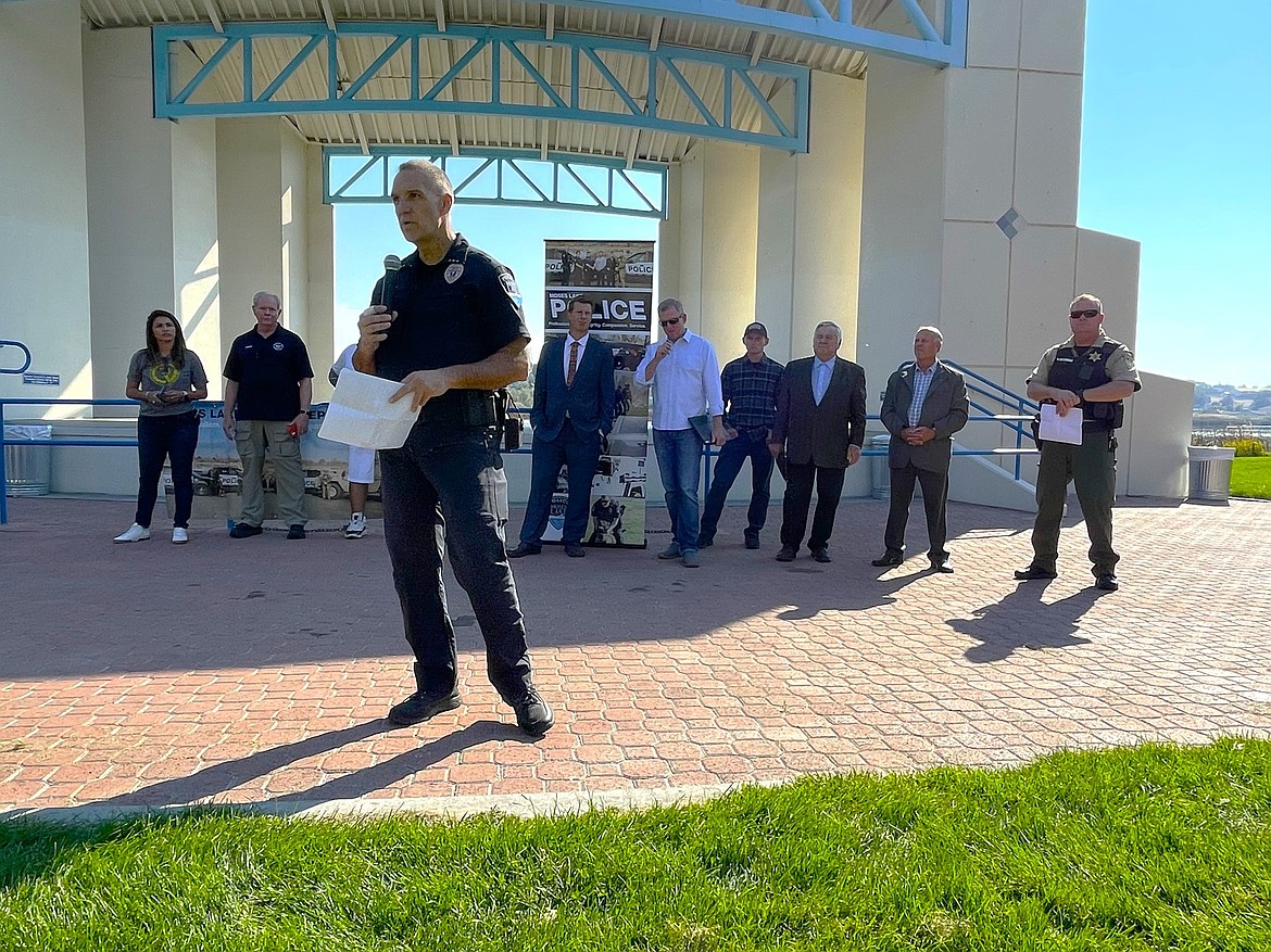 Moses Lake Police Chief Kevin Fuhr speaks during the Faith and Blue event at the amphitheater in McCosh Park in October. The Faith and Blue program brings together local congregations and law enforcement to foster communication between cops and the community.