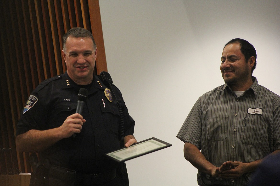 Former Moses Lake Police Department Chief Kevin Fuhr, left, awards Juan Pineda, right, with the Citizen’s Public Safety Award in 2017. Fuhr has been a supporter of community service and and ensuring public safety.