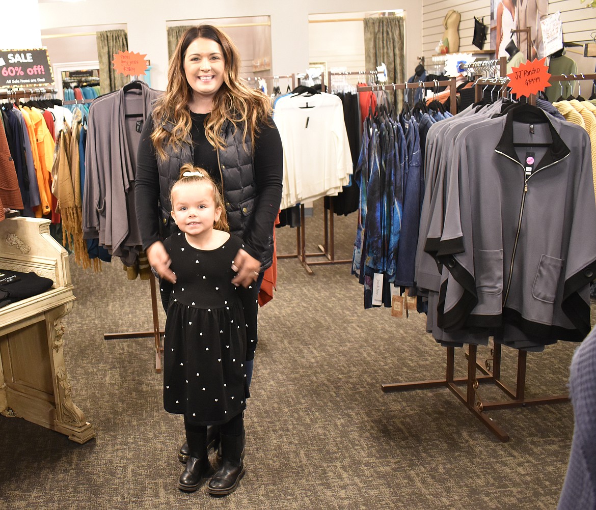 Mary Davenport and her daughter Stella stand in Davenport’s Moses Lake shop Stella & Me. The boutique, like many others across America, is hoping to draw crowds for Small Business Saturday this weekend.