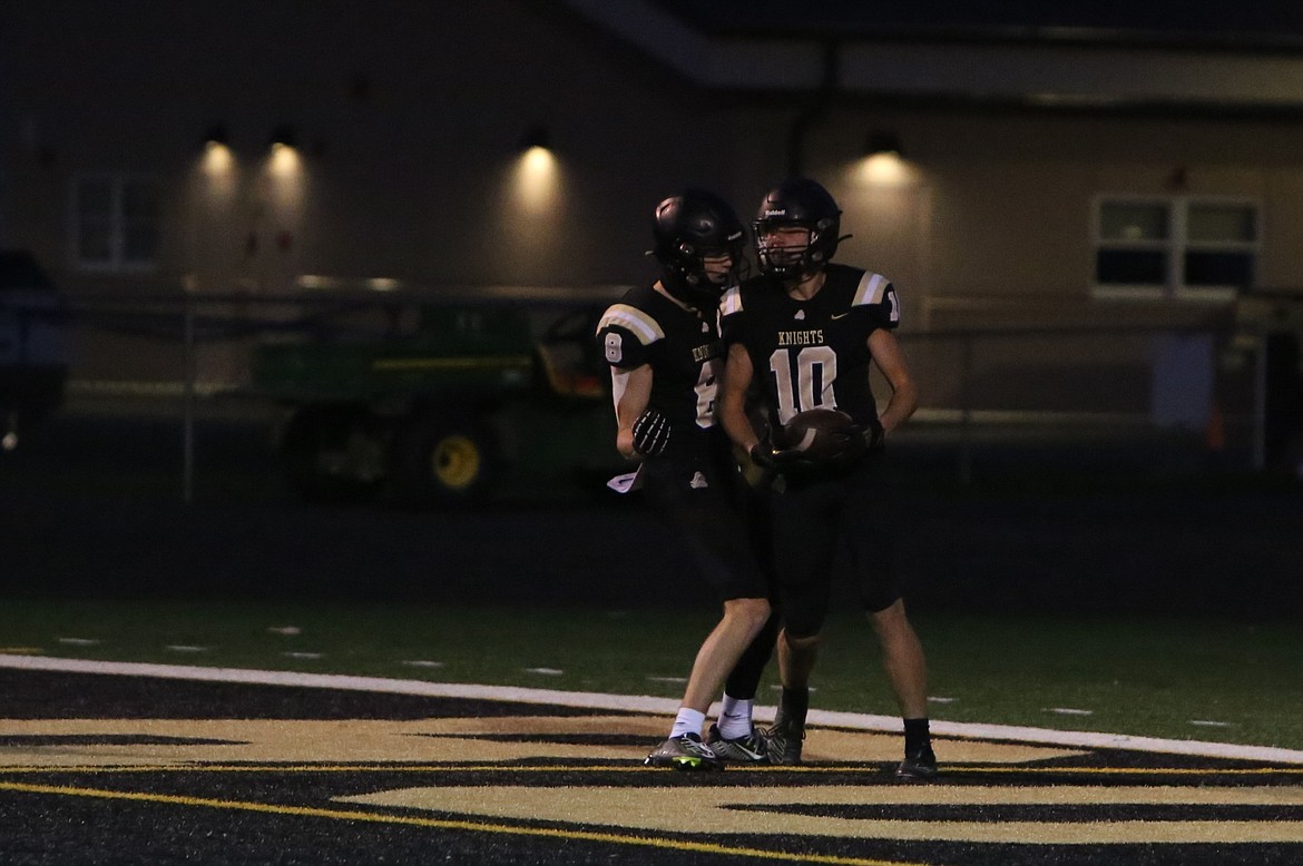 Royal receivers Caden Allred (8) and Ben Jenks (10) celebrate in the end zone after Jenks caught a touchdown pass against Eatonville on Nov. 10.