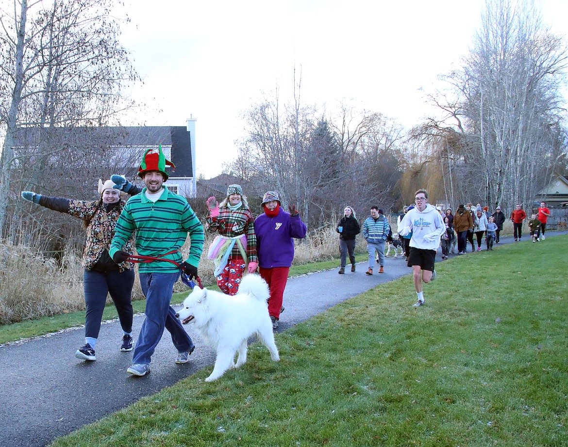 Turkey Trot participants smile for the camera as they take part in the annual event.