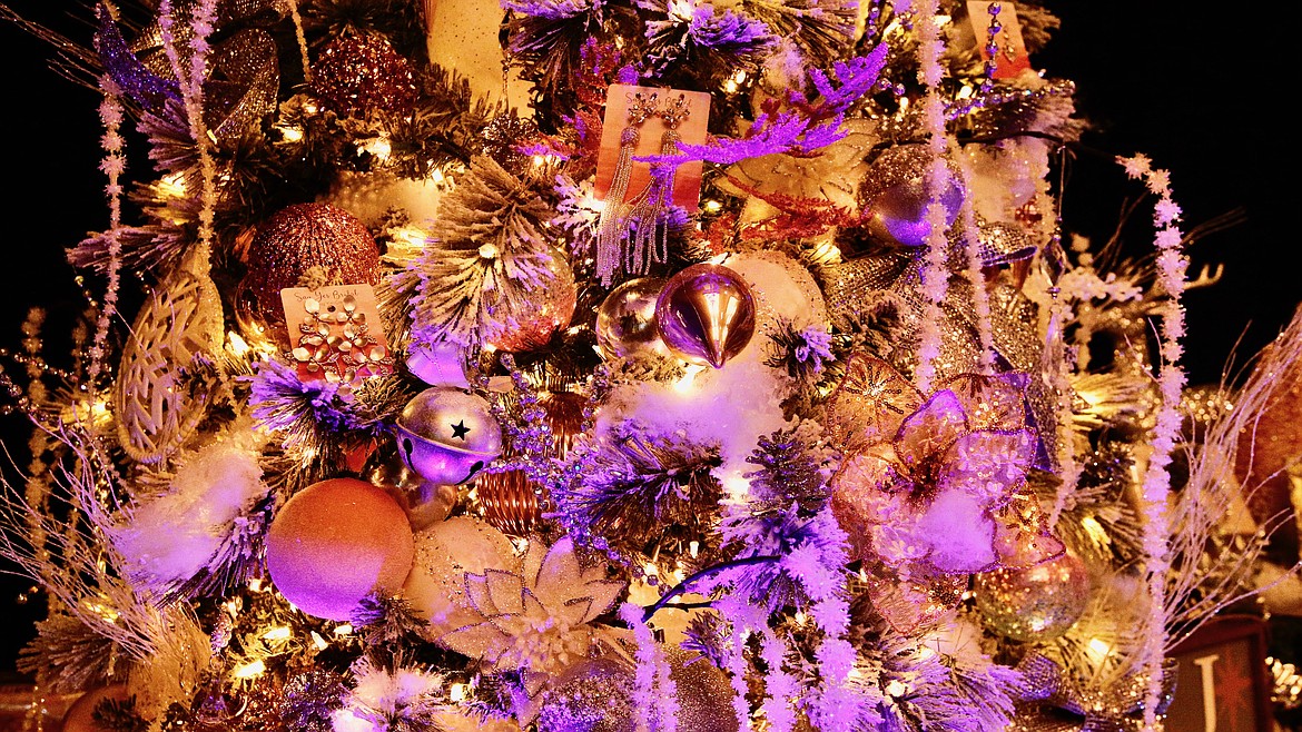 A close up of “Silver Bells and Carousels,” one of the Festival of Trees displays.