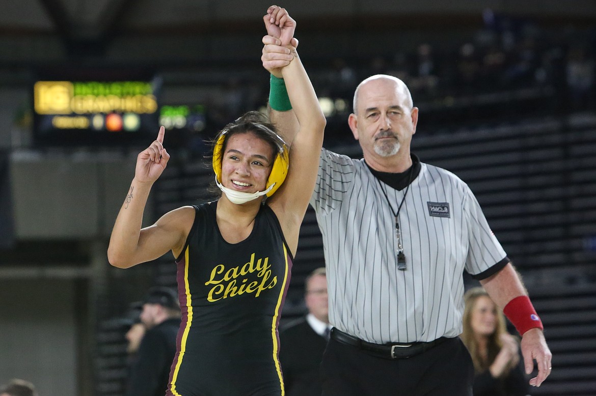 Moses Lake senior Ashley Naranjo, left, won her second-straight state championship at the Girls 3A/4A Mat Classic in Tacoma. Naranjo is seeking her third-straight title this year.