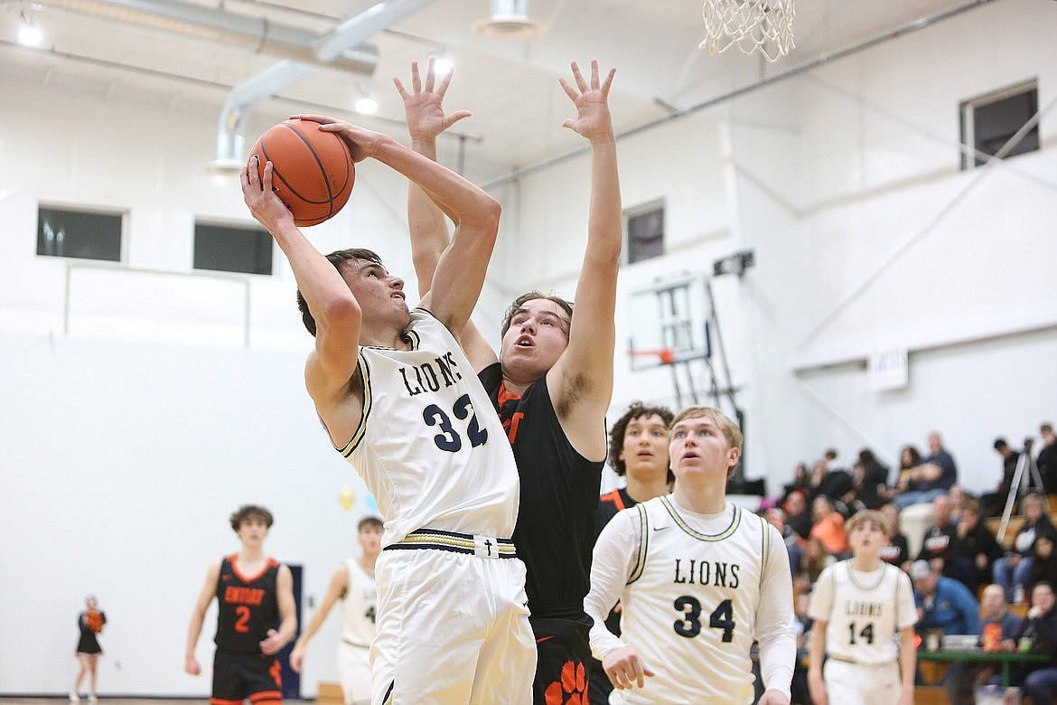 MLCA/CCS sophomore Dennis Gulenko looks to shoot the ball against Entiat last season.