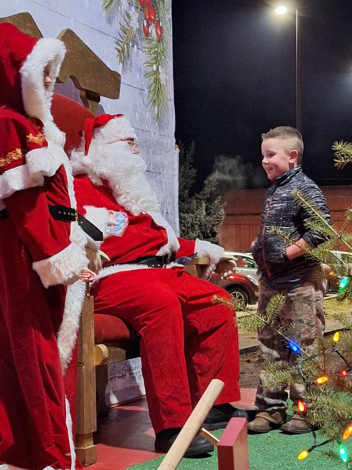 Santa and Mrs. Claus greeted kids in Troy on Saturday, Nov. 25, to hear their Christmas wishes. (Hannah Chumley/The Western News)