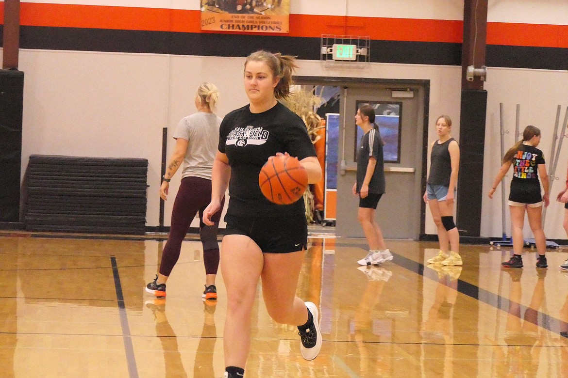 Junior post player Lexi Deming gets in some dribbling work during practice this past week as the Trotters prepare for their season opener this Friday in Hamilton versus Valley Christian.  (Chuck Bandel/VP-MI)