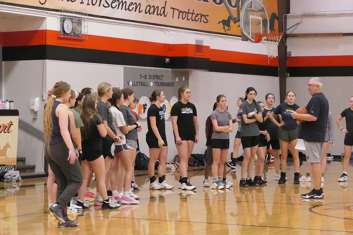 Head girls' basketball coach Brooks Sanford talks to his team during preseason practice earlier last week.  The Trotters have 25 players who turned out for what could be a promising 2023-24 season.   (Chuck Bandel/VP-MI)