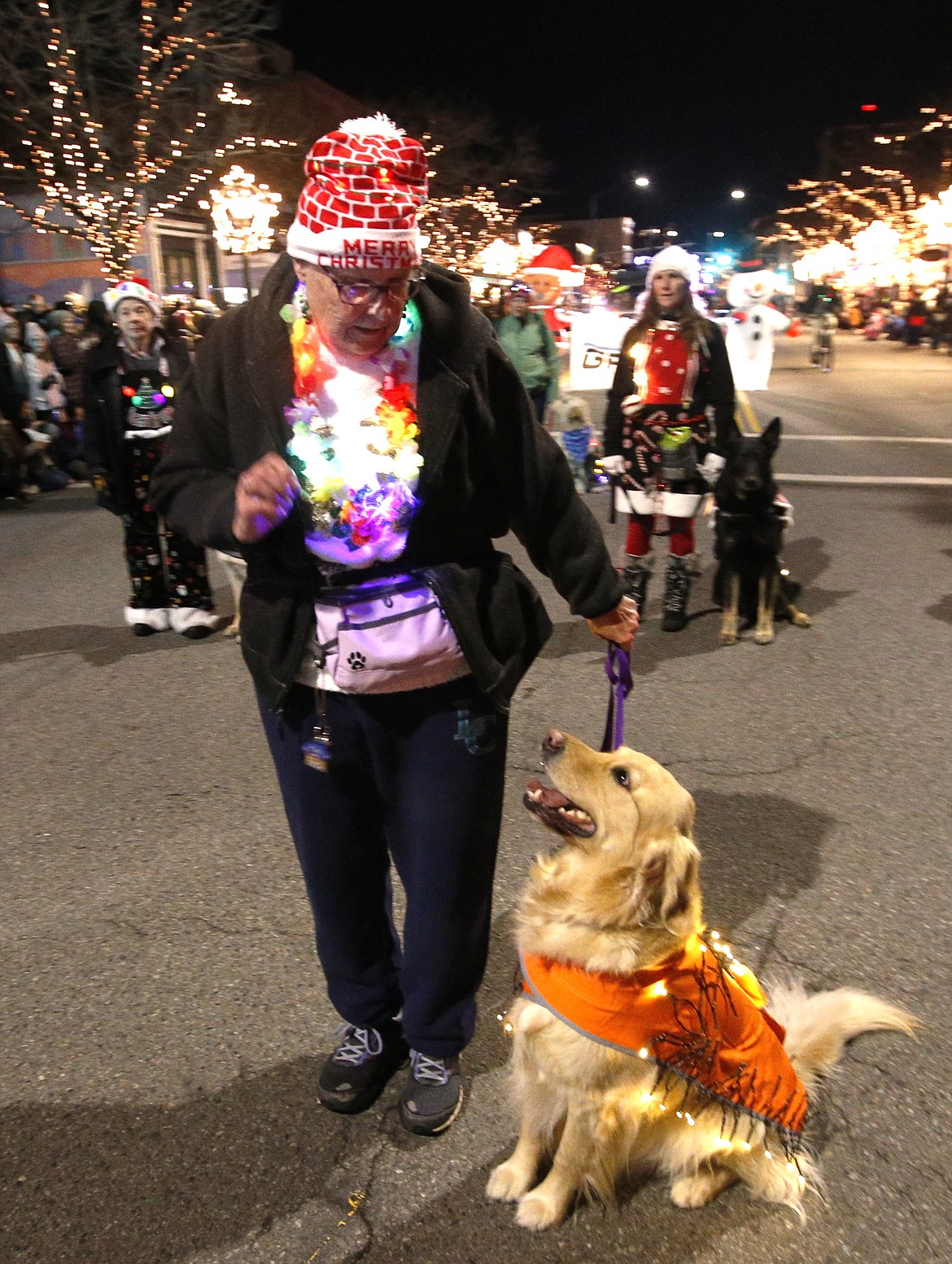 Carol Cook and Maggie join the Coeur d'Alene Dog Fanciers in the parade.