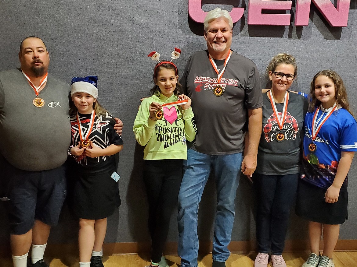 Courtesy photo
Sunset Bowling Center hosted its annual Youth/Adult Scotch Doubles Tournament on Saturday. In the Preps division, first place was Stella Minor/Kelly Minor, 1472; second place was Abby Kuespert/Amanda Kuespert, 1451; and third place was Emerie Walker/Patrick Walker, 1439. From left are Patrick Walker, Emerie Walker, Stella Minor, Kelly Minor, Amanda Kuespert and Abby Kuespert.