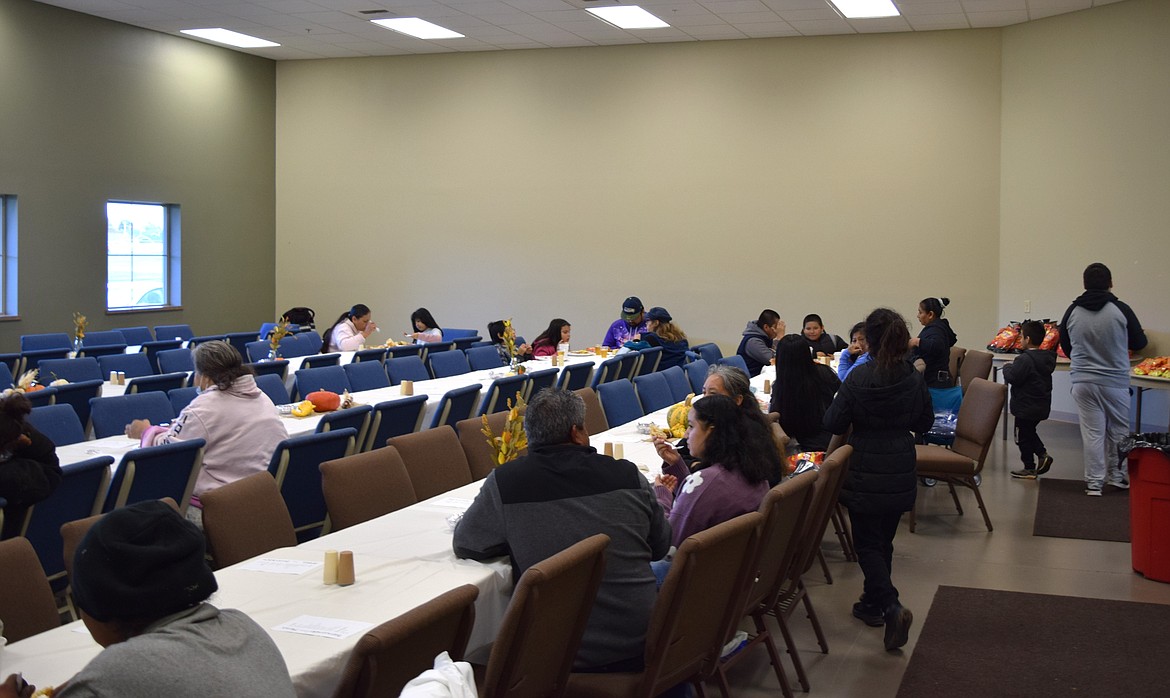 Othello residents and food-insecure individuals enjoy a hot Thanksgiving meal Thursday at the Othello Church of the Nazarene.