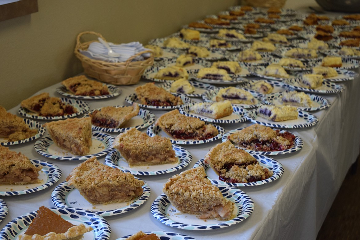 Rows of different pie slices at the Thanksgiving meal event Thursday at Othello Church of the Nazarene. The Cow Path Bakery, who organized the event, provided all the desserts and baked goods for the meal.