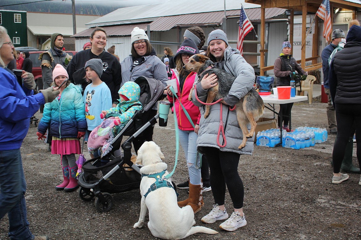 Runners, walkers and dog-lovers filled the parking lot of the Mineral County Food Back Thanksgiving morning for the Turkey Trot 5K. (Monte Turner/Mineral Independent)