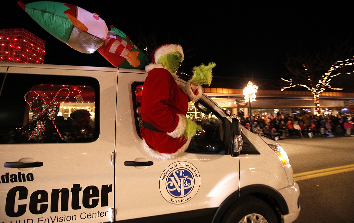 The Grinch rides with the St. Vincent de Paul of North Idaho entry.