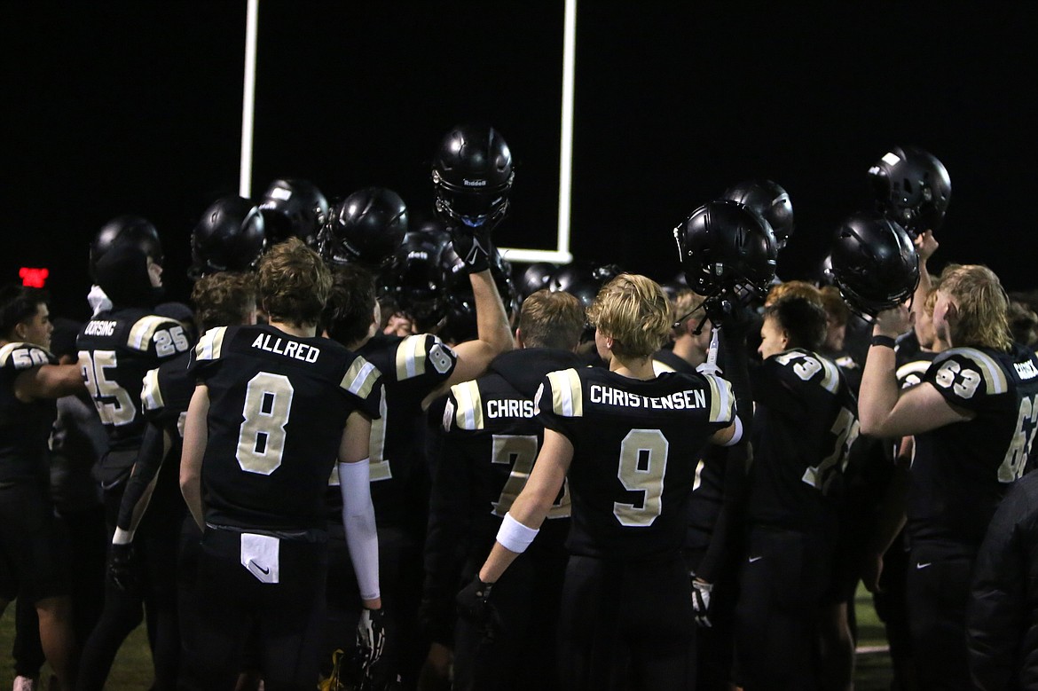 Royal players sing the school’s fight song after defeating Seton Catholic 42-0 in the 1A State Football Tournament semifinals.