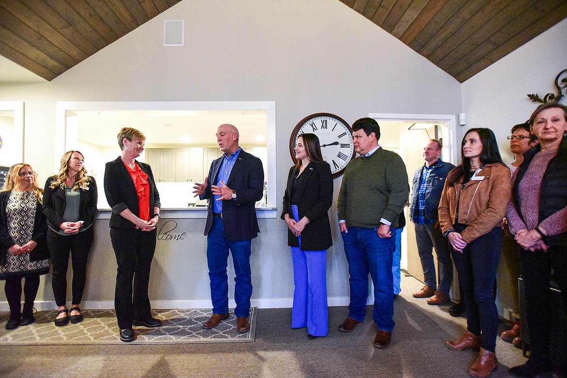 Gov. Greg Gianforte speaks with Michelle Reimer, executive director of Hope Pregnancy Ministries, and Reps. Courtenay Sprunger and Tony Brockman, during a stop on Gianforte's 12 Days of Giving campaign at Clear Choice Clinic in Kalispell on Tuesday, Nov. 28. (Casey Kreider/Daily Inter Lake)