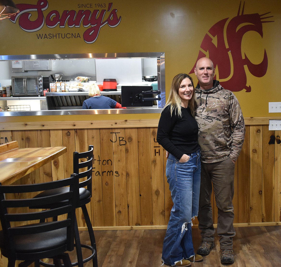 Bridget and Paul Coon stand in Sonny’s Tavern and Grill in Washtucna, which they’ve recently brought back to life.