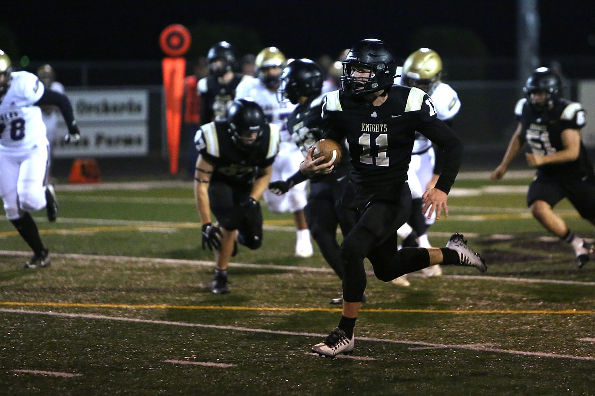 Royal junior Lance Allred (11) earned first-team all-league honors as a quarterback and a linebacker and brought home the South Central Athletic Conference (East)’s Offensive Player of the Year award.