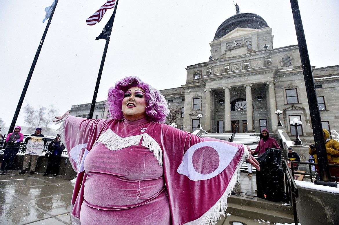 Scenes from a drag show at the Montana Capitol held in protest to a slate of bills aimed at how trans Montanans live, April 13, 2023, in Helena, Mont. Opponents of a law that restricted drag performances and banned drag reading events at public schools and libraries asked a federal judge late Tuesday, Nov. 28 to declare the law unconstitutional without the case going to trial. The motion for summary judgment argues there is no dispute over key facts in the case. The law has already been blocked under a preliminary injunction issued in October. (Thom Bridge/Independent Record via AP, File)