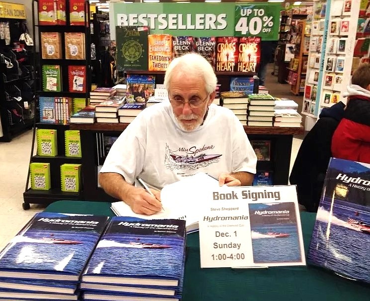 Local historian Stephen Shepperd signs copies of his book, “Hydromania: A History of the Diamond Cup."