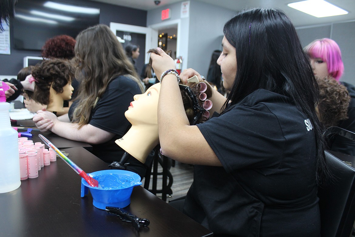 Izabella Vasquez, Moses Lake, learns the techniques of cosmetology at Char Glo School of Beauty in Moses Lake.