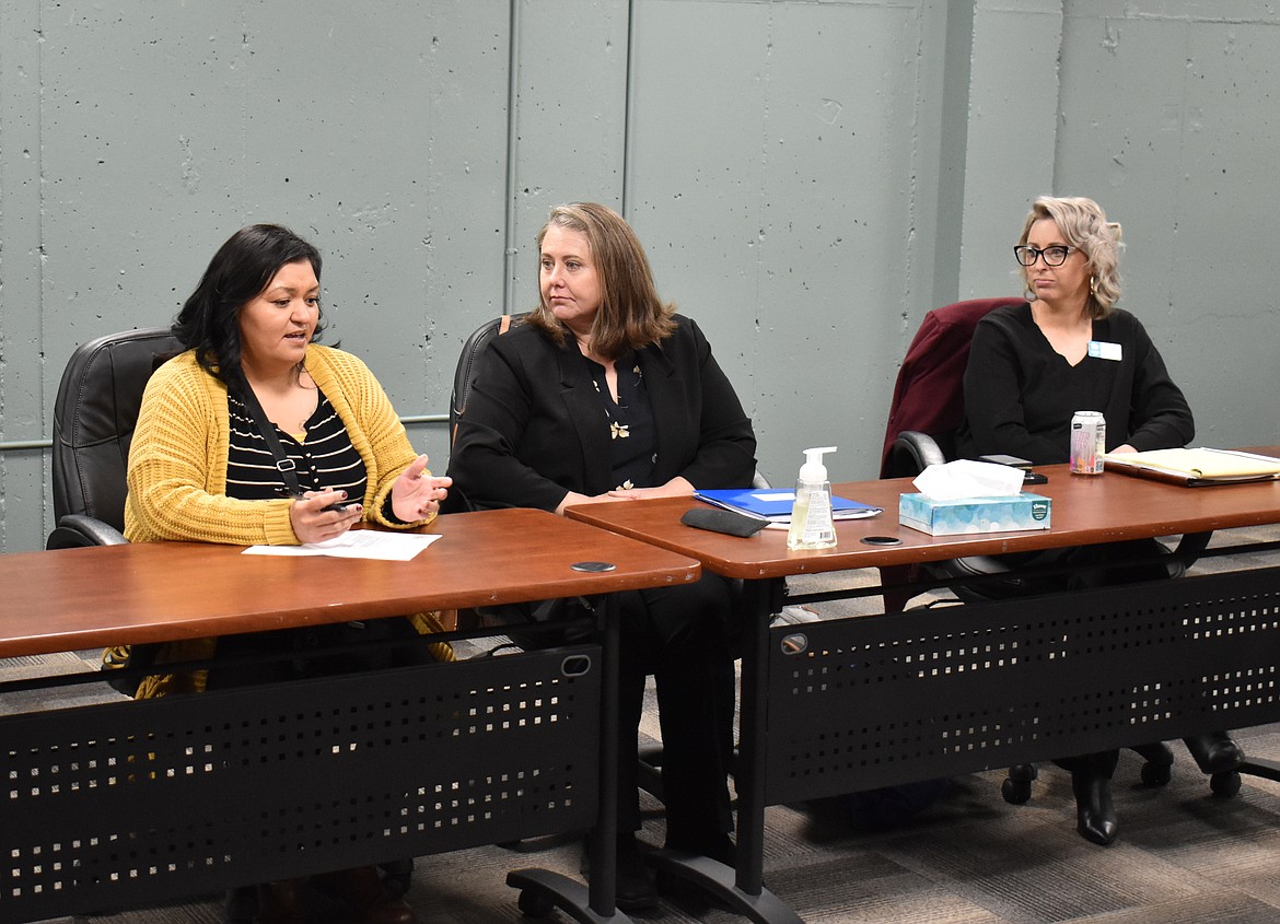 Alexandra Colin, left, of Moses Lake tells the story of her family’s move into a Habitat for Humanity home at Wednesday’s round table meeting with Gov. Jay Inslee.