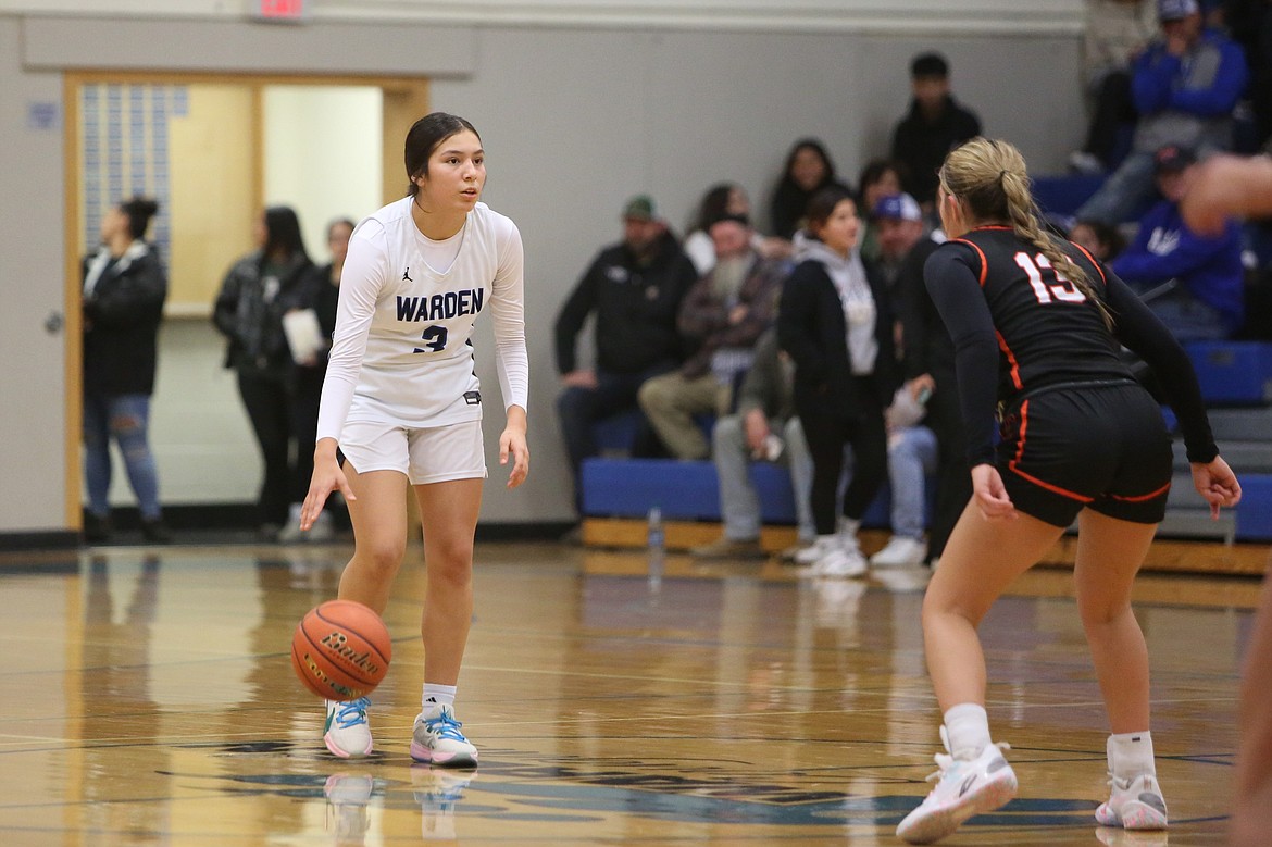 Warden sophomore Angelina Buck (3) takes the ball up the floor in overtime against Cashmere.