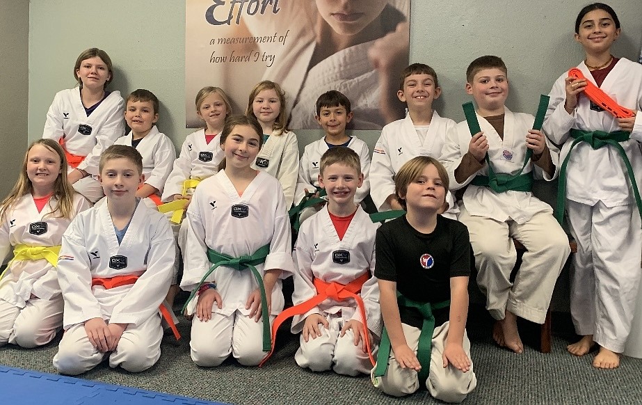 Sandpoint Martial Arts athletes pose for a photo after completing their belt testing earlier this month. Front row, left to right, Nevaeh Inman (Yellow Belt), Kolter Leuallen (Orange Belt), Zoie Ateho (Green Belt), Decklan Cryar (Orange Belt), Oliver Pohl (Green Belt). Back row, left to right, Serenity Inman (Orange Belt), Roman Inman (Orange Belt), Meela Spoelstra (Yellow Belt), Brina Funk (Green Belt), Luca Ateho (Green Belt), Bryson Sahleen (Green Belt), Mattox Fitchett (Green Belt), Eva Ateho (Green Belt).