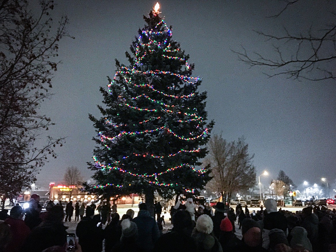 The Community Tree is lit during the Downtown Kalispell Holiday Stroll and Tree Lighting on Friday, Dec. 1. (Casey Kreider/Daily Inter Lake)