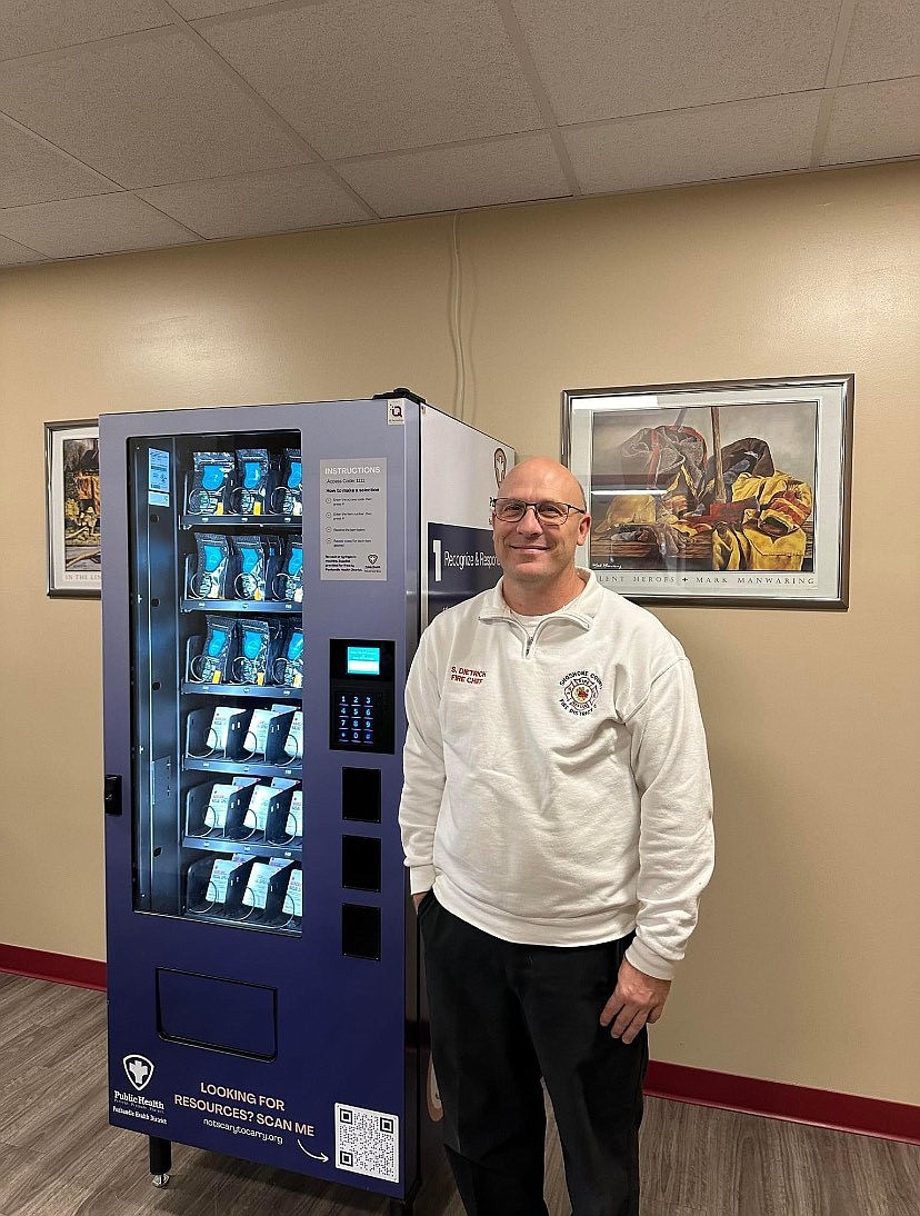 Shoshone County Fire District No. 2 Chief Scott Dietrich stands by the new Narcan station in the firehouse in Kellogg.