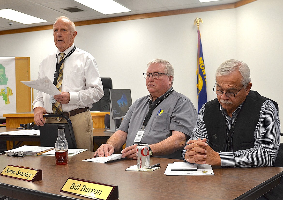 Lake County Commissioners Gale Decker, Steve Stanley and Bill Barron address the public and law enforcement during a meeting in December to discuss the county's withdrawal from the  Public Law 280 agreement, which has governed felony prosecutions over tribal members on the Flathead Reservation since the mid-1960s. (Kristi Niemeyer/Leader)