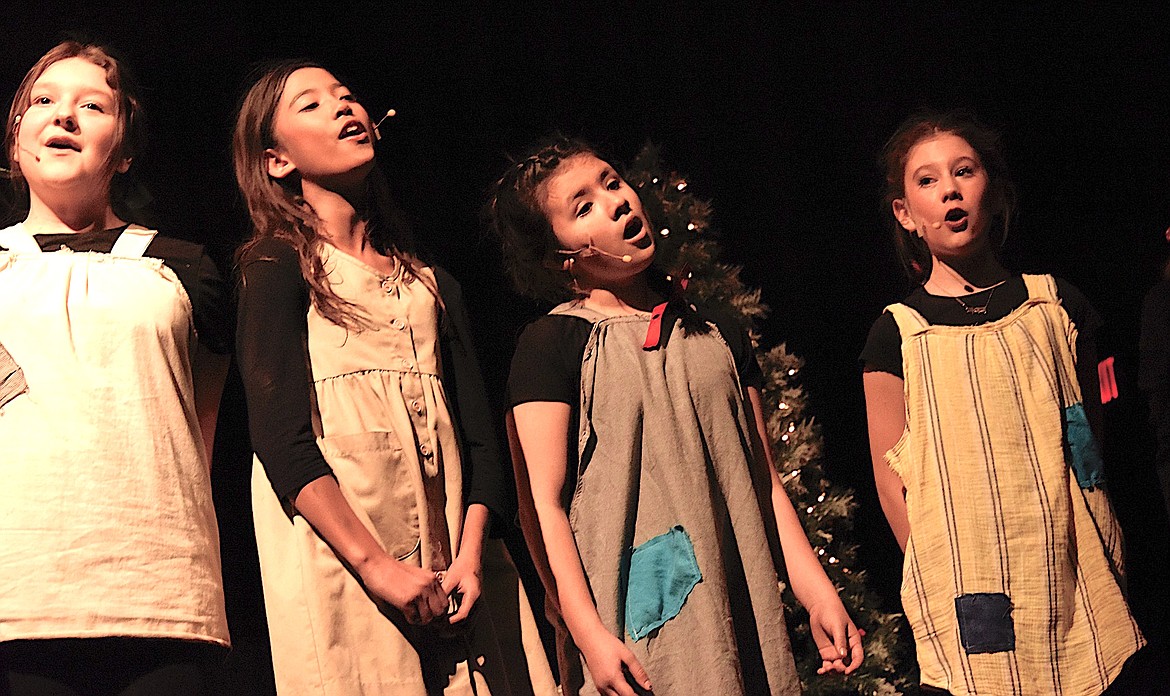 The orphans sing in the musical "Annie Jr." playing now at Polson High School.
(Berl Tiskus/Leader)