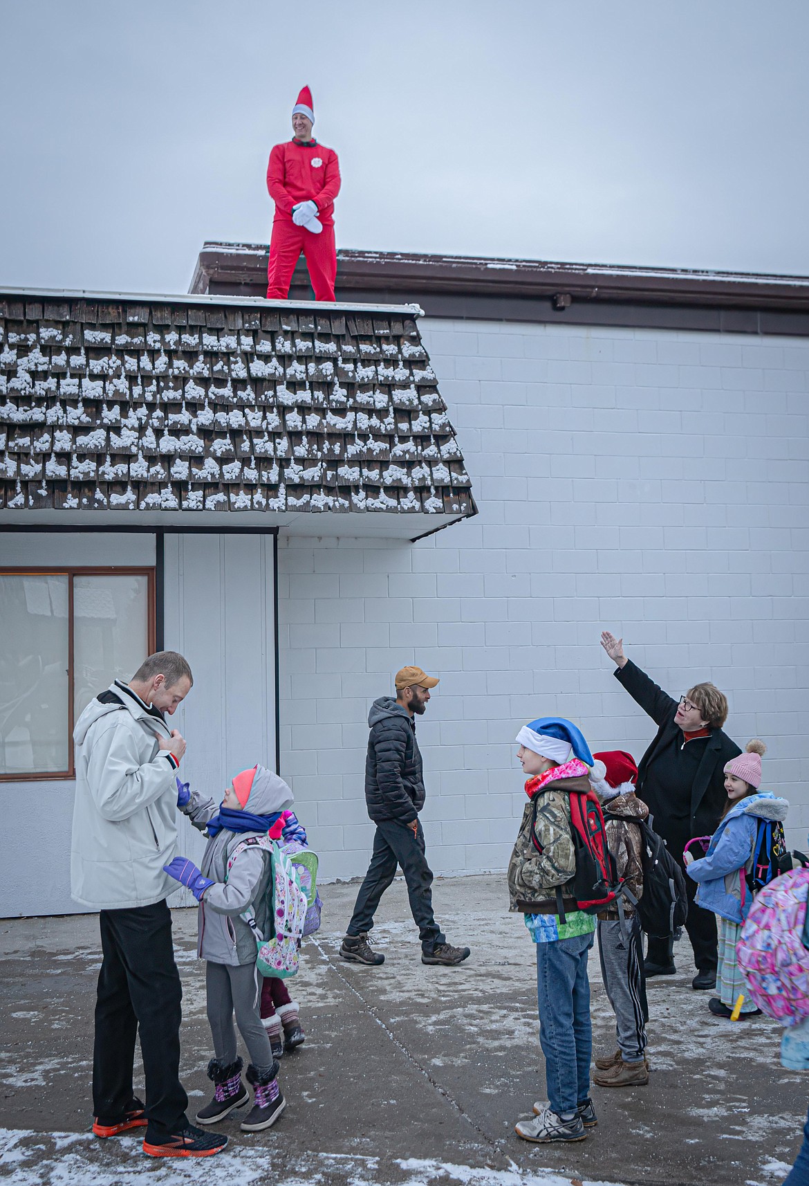 Plains Superintendent Kathleen Walsh with students investigating the Elf of the Roof case. (Tracy Scott/Valley Press)