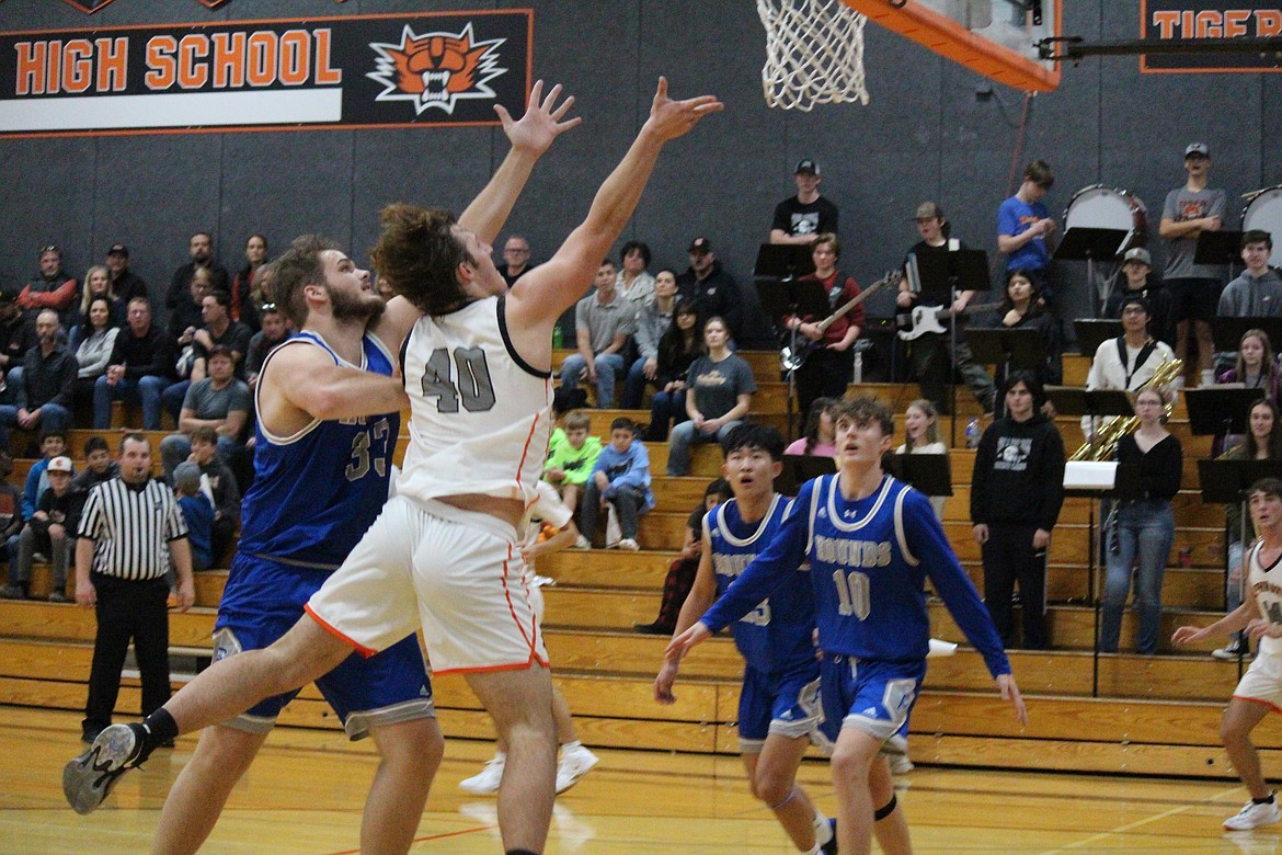 Forward Jaxson Elliot (40) takes the shot in Ephrata’s game Saturday against Pullman.