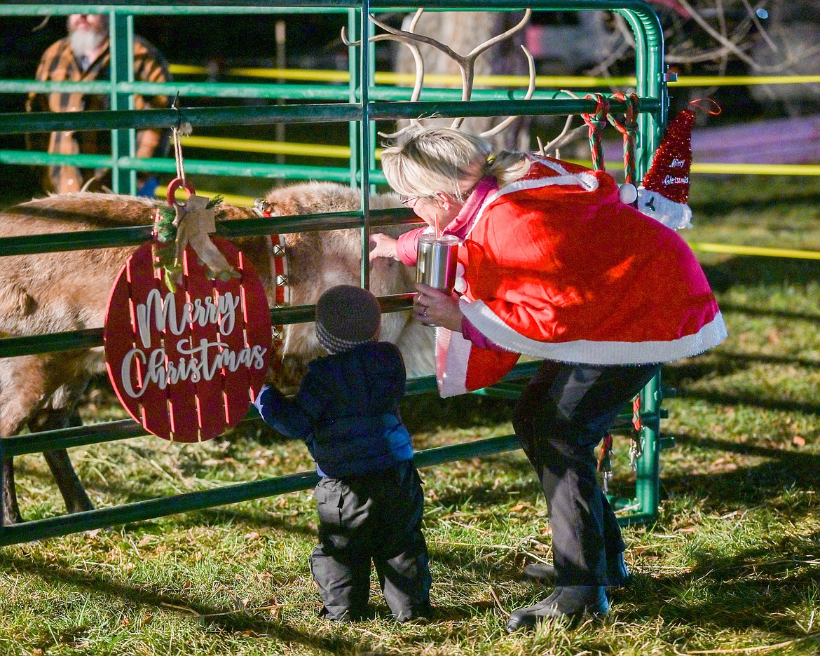 A genuine reindeer, rumored to be on loan from the famed North Pole herd, dropped by St. Ignatius Saturday in time for holiday festivities at Good Old Days Park. (Christa Umphrey photo)