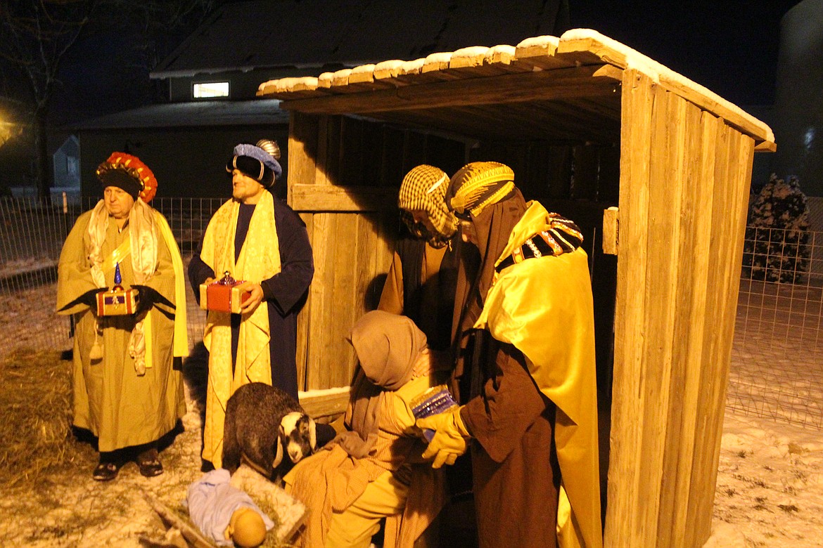 Volunteers working with the Quincy Valley Historical Society reenacted the Christmas story Friday.